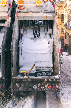 Snowplow in action during urban winter cleanup