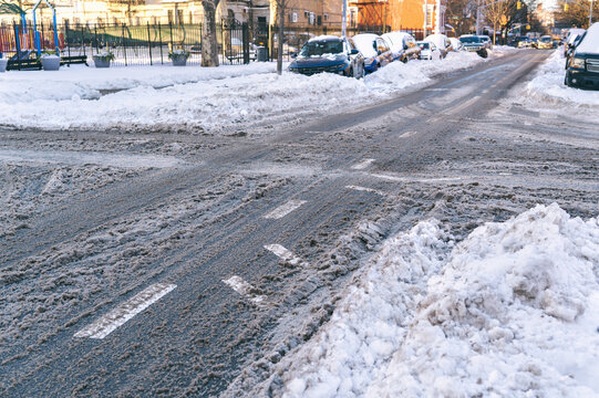 Snow-covered urban street after winter storm