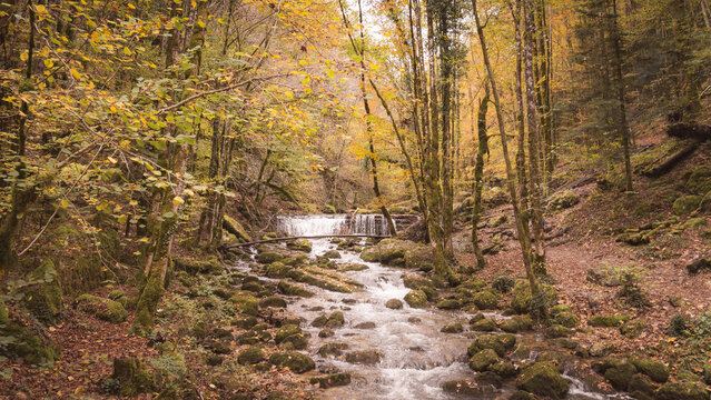 Cascades du Herisson in autumnal Jura forest