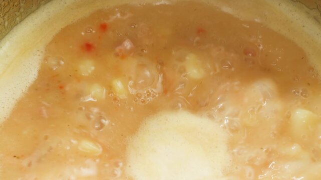 Split pea soup, Eating mashed pea soup with sausages and pork. Popular german or slavic food, winter street food.