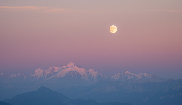 Mont blanc under full moonlight in the serene alps