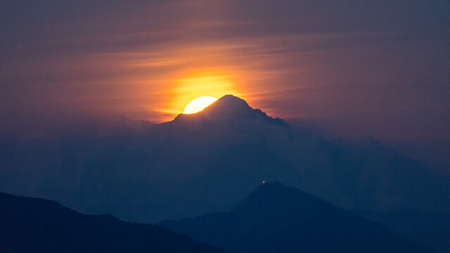 Mont Blanc and full moon shining over the Alps