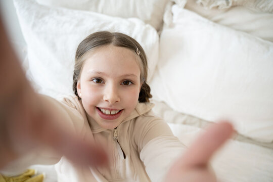 Girl smiling with outstretched arms