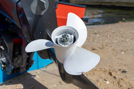 Outboard motor propeller closeup on arosa island beach