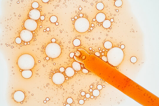 Vitamin C serum with pipette and bubbles