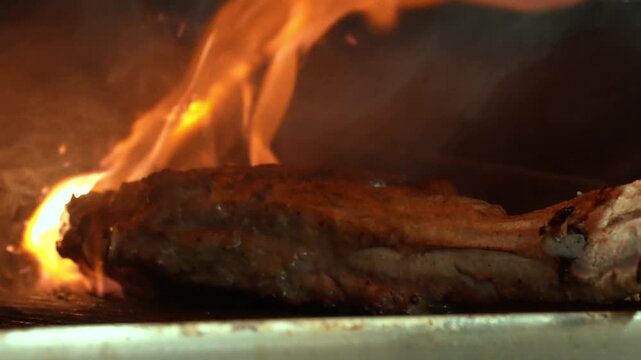 Cooking Tomahawk Steak. Premium Meat Preparation. Video of tomahawk steak cooking with high heat and rich texture.