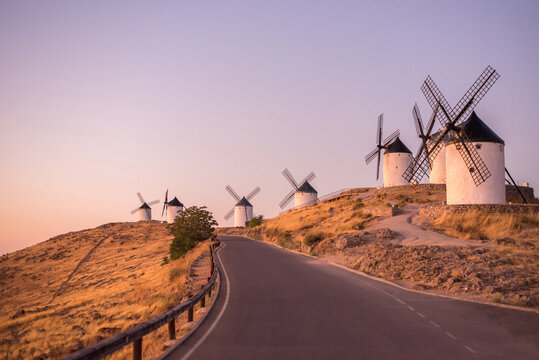 Windmills of Consuegra at sunset in La Mancha, Spain