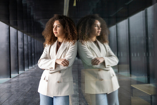 Confident woman in modern business setting