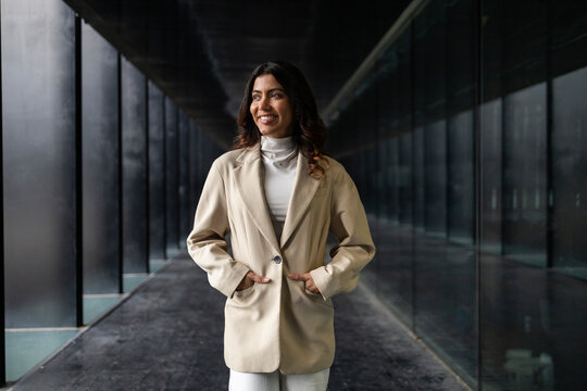 Confident professional woman in a modern business environment