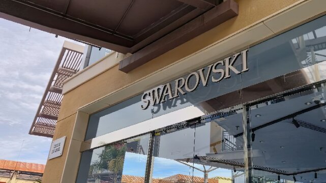 La Zenia, Spain - February 07, 2026: Swarovski storefront with glass entrance and modern architecture, showcasing luxury jewelry and crystal products