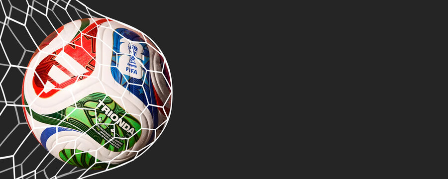 Karachi, Pakistan, 23 March 2026. Horizontal wallpaper for FIFA World Cup 2026. Trionda match ball, soccer event across the USA, Mexico, and Canada. Soccer or football tournament. Black empty space.