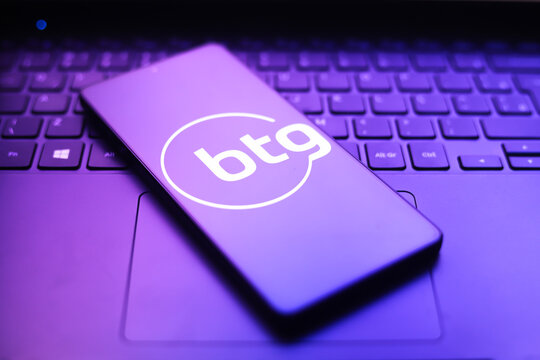 The BTG Pactual logo appears on a smartphone screen in this photo illustration in Ontario, Canada, on March 23, 2026. A hacker attack against the Brazilian bank diverted around R$100 million reais 