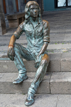 Santa Cruz de La Palma, Spain - February 13, 2026:  Sculpture of Felix Casanova sitting on the steps along Calle O'Daly