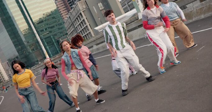 Hip hop, diversity and dancing friends in city for freedom, creative art and grunge motion performance on road. Content creation, influencer people and energy for breakdance, talent and celebration