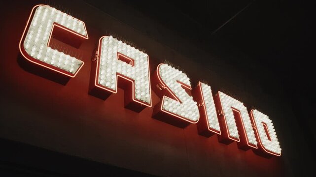 A detail of an electric sign that says &ntilde;casino&icirc; near Laughlin , NV