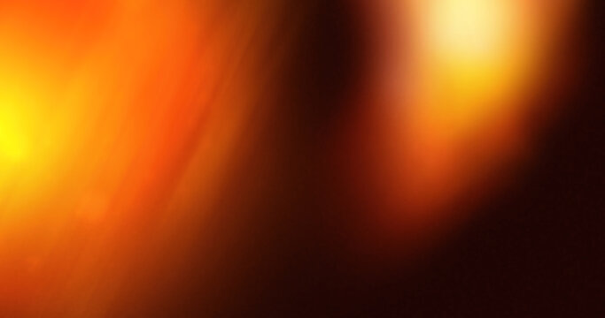 Abstract warm gradient background with smooth transitions of orange, red, and yellow tones. Soft blurred texture with light glow, ideal for design, wallpaper, or creative backdrop