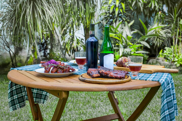 Outdoor table set for a summer barbecue meal