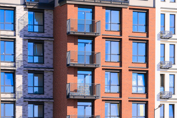 Fototapeta premium Cityscape on a summer day, modern buildings and houses 