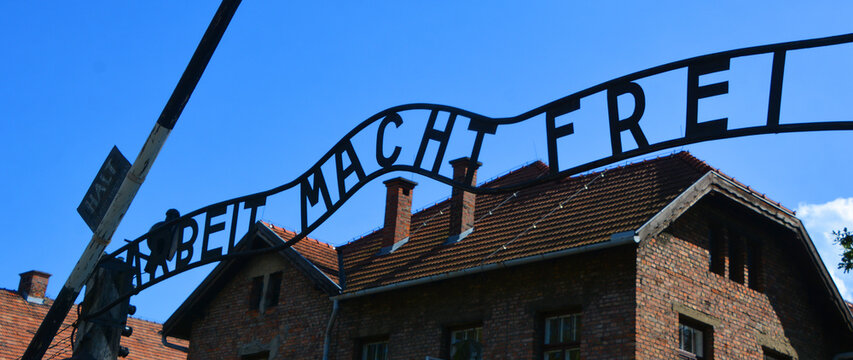 AUSCHWITZ BIRKENAU POLAND: Auschwitz concentration camp ARBEIT MACHT FREI sign was a network of German Nazi concentration camps and extermination camps built and operated by the Third Reich.