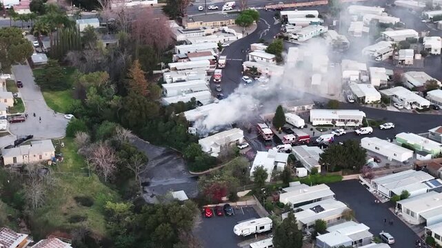 Yucaipa, California, March 15, 2026:A Fife Response at a Trailer Park with Fire Units and First Responders as smoke pours from the site from a Drone UAV.