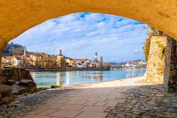 Passau, Germany. Inn river and old town of Passau riverfront walkway view