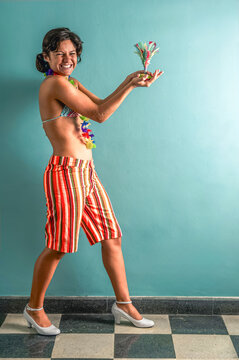 Brazilian woman playing peteca celebrating carnival tradition
