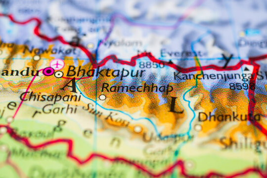 Mount Everest and Kanchenjunga peaks marked on Nepal topographic map.