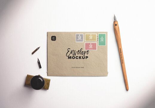 Envelope Mockup with Postage Stamps and Calligraphy Pen