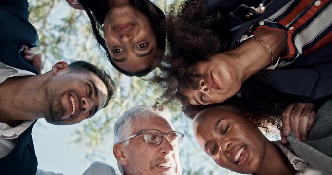 Business, people and hug in circle for teamwork on company project for goals and collaboration or partnership. Diversity, low angle and happiness outdoor with community, solidarity and support.