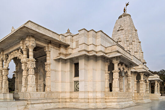 View of the ethereal white marble Birla Temple, a beacon of peace and architectural splendor rising majestically against the sky, Jaipur, Rajasthan, India.