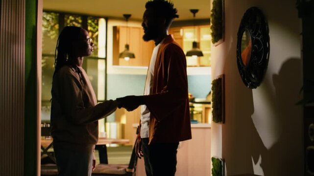 Couple, together again, after argument, sharing intimacy, and peaceful affection, African American man and woman demonstrate empathy, trust rebuilding and communication success.