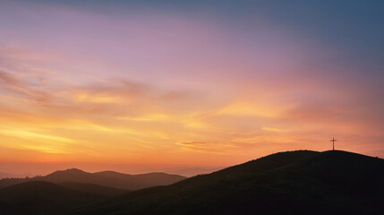 Obraz premium Light pastel dawn sky over rolling hills with subtle cross silhouette at distance, calm gradient colors, peaceful and uplifting easter morning mood, wide cinematic composition. with copy space