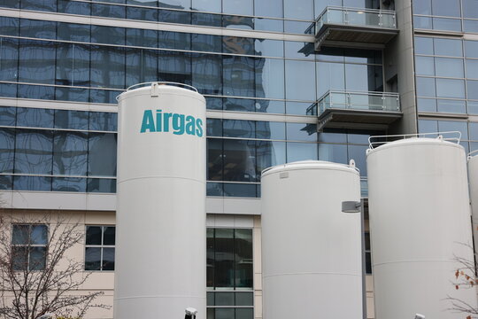 Airgas branded industrial gas storage tanks outside a commercial laboratory building in Kendall Square, Cambridge, Massachusetts, USA