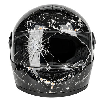 A damaged motorcycle helmet with a cracked visor on transparent background