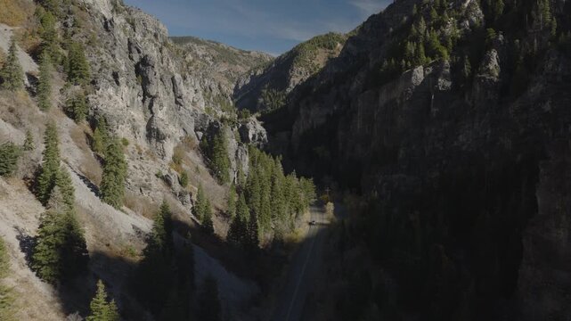 An aerial Flyover American Fork Canyon and Hwy in late summer, Utah
