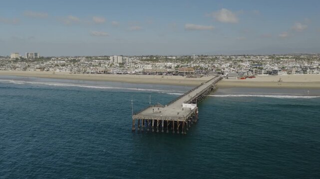 An aerial shot of Newport Beach and the Newport Pier at late afternoon, Newport Beach, CA