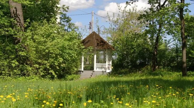 Low circular drone flight around gazebo in Klin