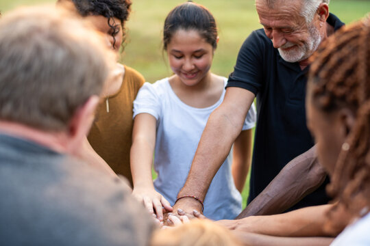 Diverse group unity outdoors.
