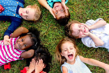 Fototapeta premium Joyful children playing outdoors photo