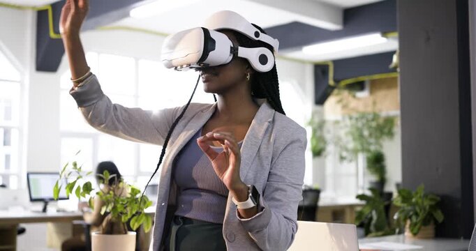 Raising hands summoning virtual control panel, woman pinching and pointing menus in modern office