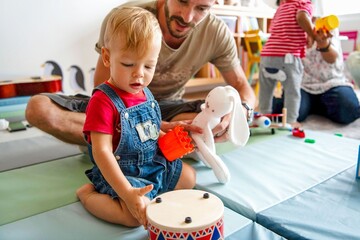 Children playing with musical toys. © Rawpixel.com