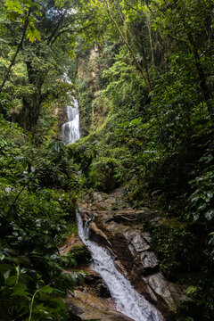 Pristine Tropical Waterfall Cascada Norte in Waraira Repano National Park. Hidden gem along the Rio Norte river in the lush mountains of Guatire, Miranda, Venezuela