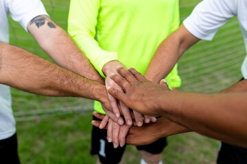 Unity teamwork hands soccer field © Rawpixel.com