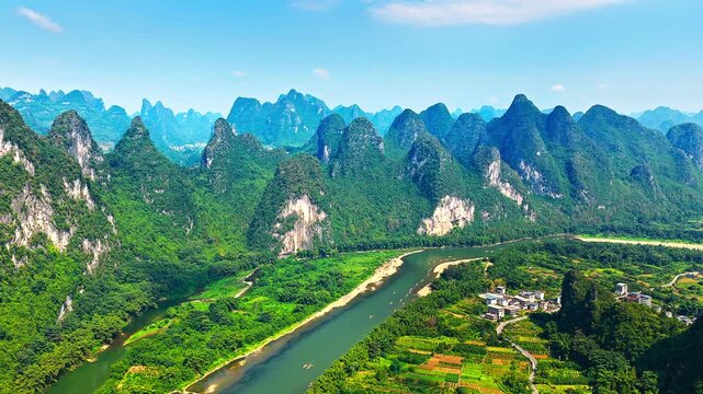 Stunning karst mountain landscape and the winding Li River in Guilin, Guangxi, China. Scenic nature background.