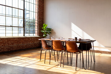 Sunlit industrial-style meeting room photo