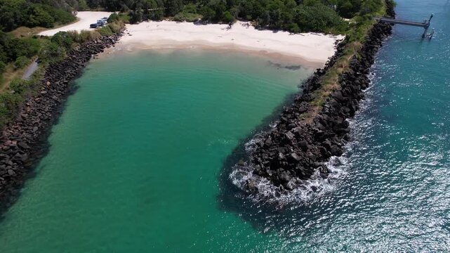 Tweed River And Marlo's Beach In Summer In Fingal Head, NSW, Australia. - aerial pullback shot
