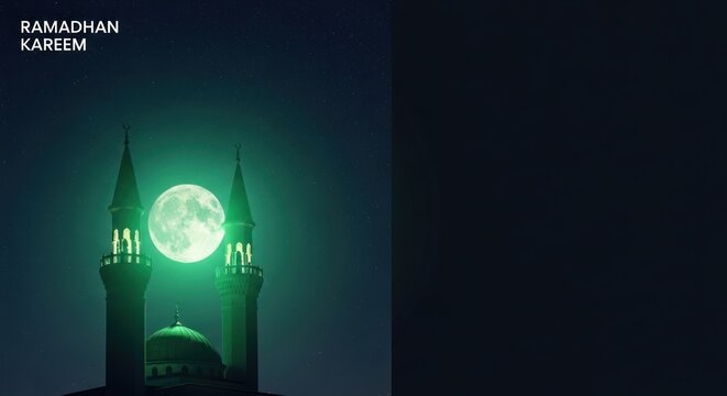 Ramadan Kareem mosque minarets illuminated by bright full moon at night.