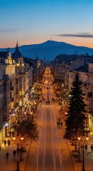 Naklejka premium Illuminated City Streetscape With Distant Mountain And Twilight Sky