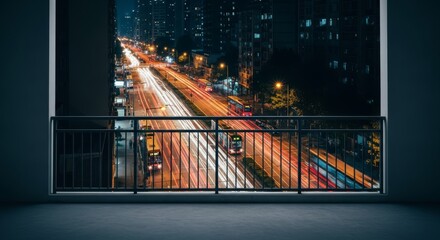 Fototapeta premium An empty balcony overlooks a busy urban street at night with light trails from moving vehicles under a dark sky during late hours, loneliness, solitude, railing