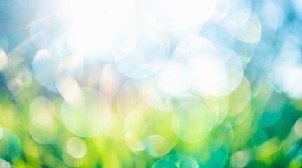 Fototapeta premium Abstract natural bokeh background with sun flare in a spring setting.
